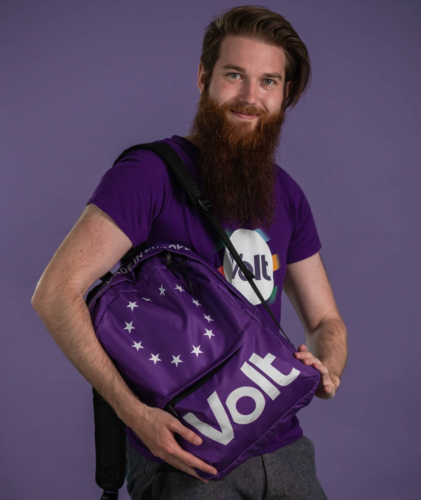 Volt member Fabian with a Volt t-shirt and a Volt backpack